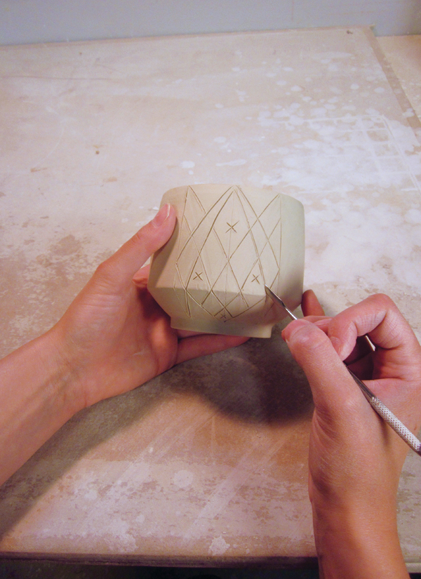 6 Draw the design in one panel. Each X marks the location of pierced elements.