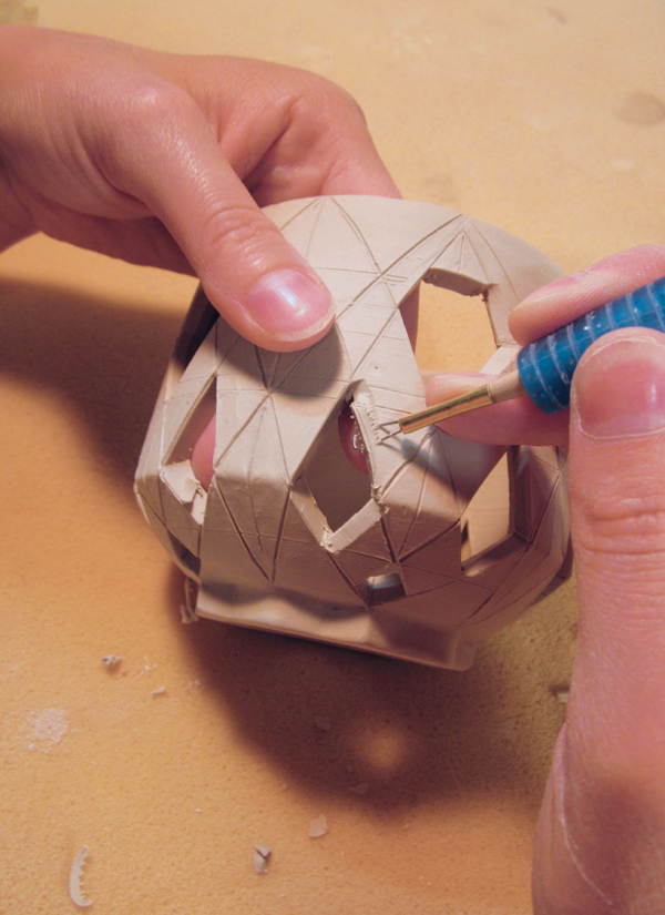 10 Bevel the cuts from the inside and outside to create a tapered edge.