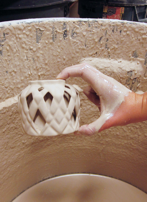 18 Glaze by dipping, where the piece is completely submerged in glaze.