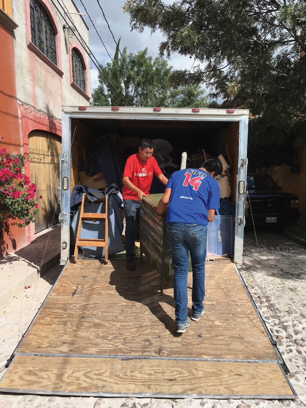 3 Unloading items after shipment from Lexington, Kentucky, to San Miguel de Allende, Mexico.