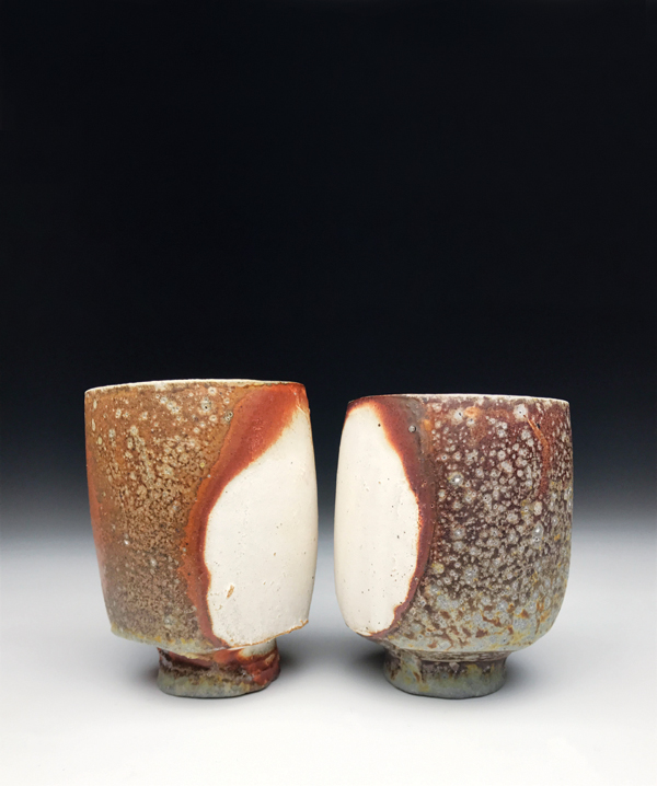 1 Two yunomis, 5 in. (13 cm) in height, red stoneware, flashing slip, soda fired to cone 11 in a gas kiln, 2017.