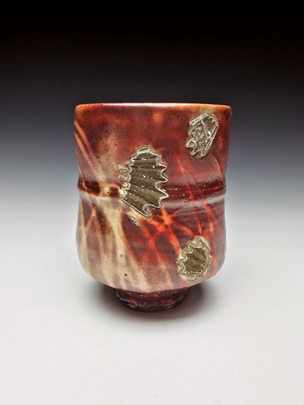 4 Yunomi, 4 1/2 in. (11 cm) in height, stoneware, white slip, shino glaze, wood fired to cone 12, side fired on shells, 2017.