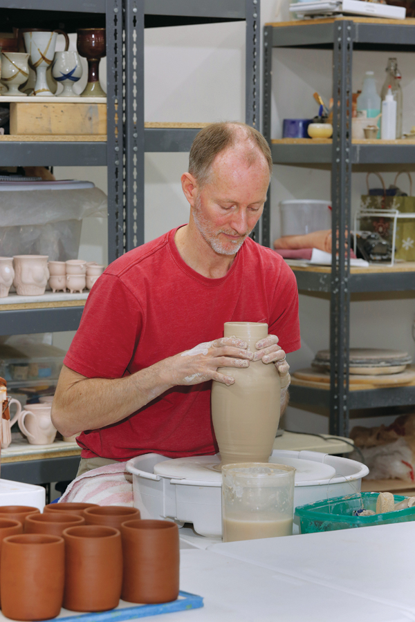 2 Clive Earnhart wheel throwing in the Advanced Studies Program, 2016–2017. Photo: Tim Barnwell.