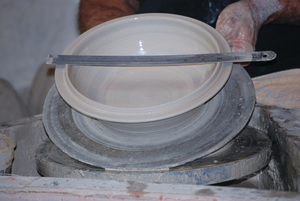 2 Measure the base diameter to determine the lid size.