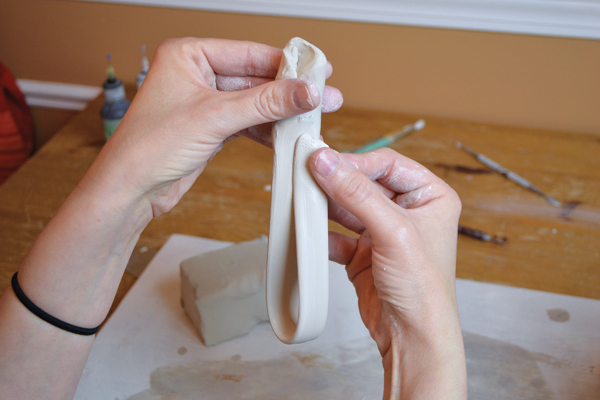 4 Double up an extra-long, pulled handle, offsetting the fold.