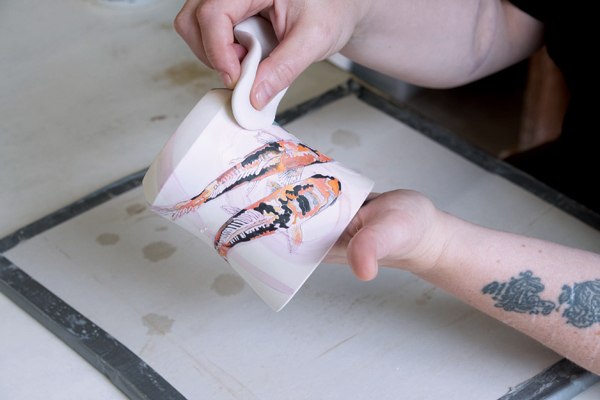 7 Gently erode the exposed clay with a wet sponge leaving a textured surface.