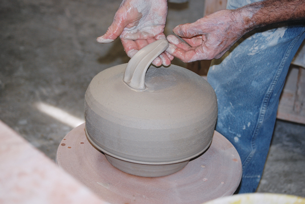 7 Shape a rough handle, attach it to the lid, then pull the rest of the handle.