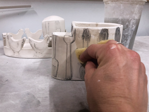 17 Brush a stain wash into the lines, then wipe it away with a damp sponge.