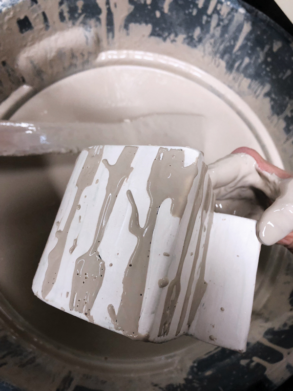 18 After the bisque, brush wax resist around the drawings, watercolor, glaze, then fire.