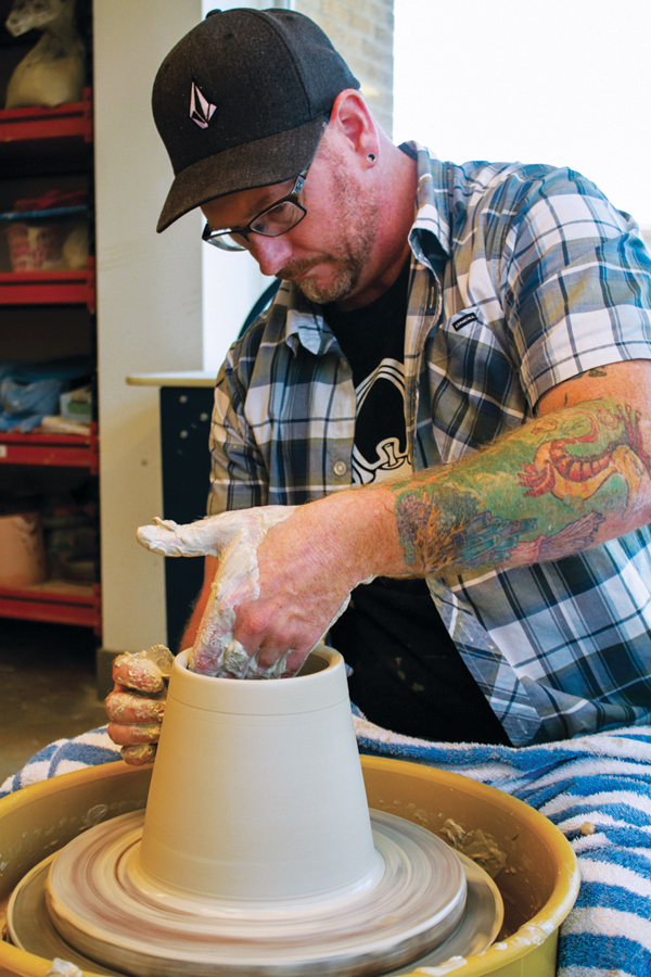 1 Throw a bottomless form, leaving extra clay at the top for a lid gallery. 