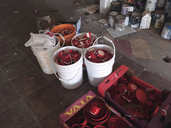 5 Pails full of glaze-fired pieces ready to be installed. 