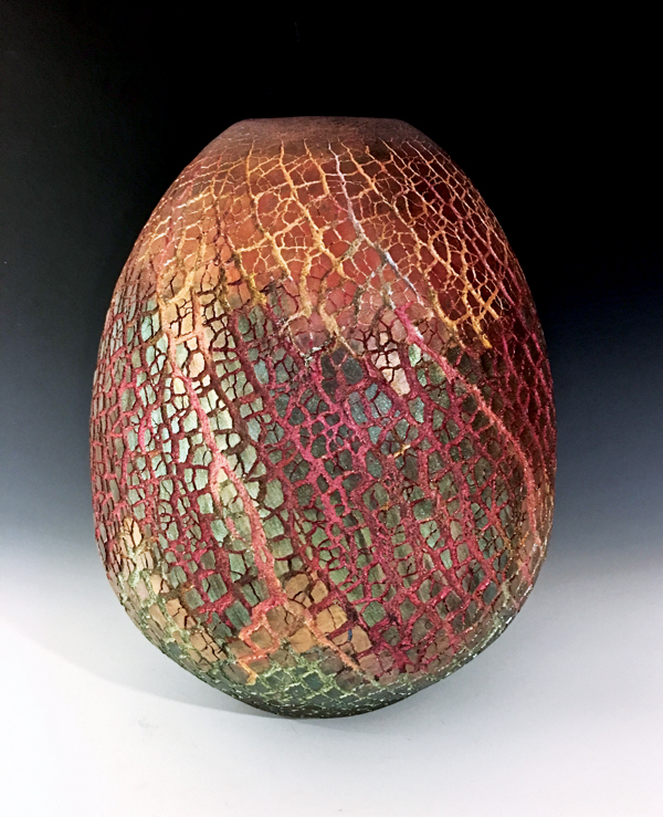 Vase, 16 in. (41 cm) in height, mica-infused sodium silicate. There are at least 7 different micas applied both pre and post firing.