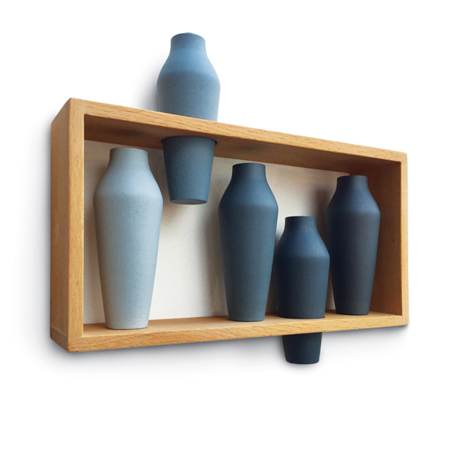 1 Katie Lowe’s Five, 93/4 in. (25 cm) in length, slip-cast Parian vessels, beechwood frame, fired to 2084°F (1140°C), 2016. 