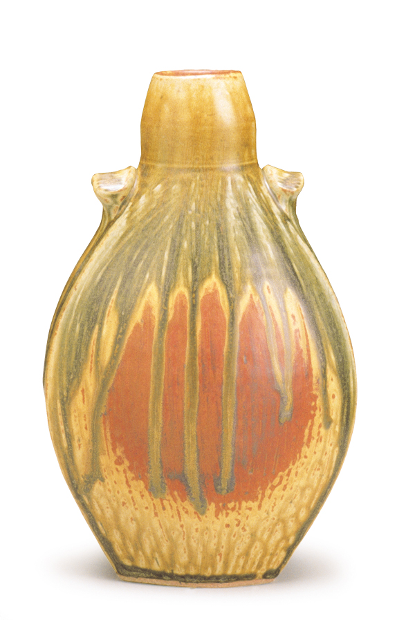 Ellen Shankin’s flattened bottle, stoneware, thrown, paddled and honed to form with a Surform, glazed with red satin matte and fake-ash glaze, oxide washes. Photo: Tim Barnwell.