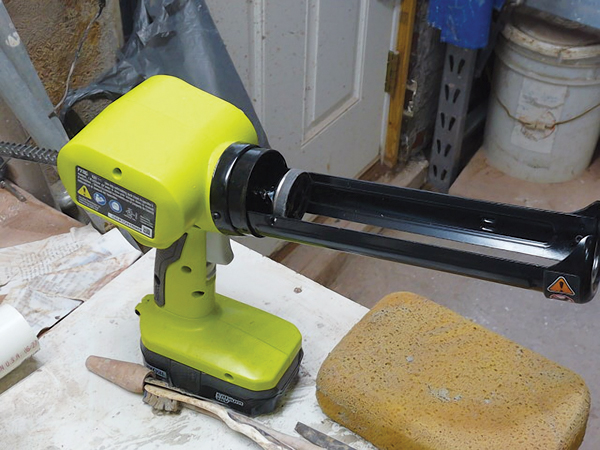 1 Electric caulk gun before loading.