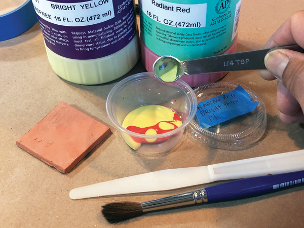 2 Mixing equal parts of colors together that contrast enough to have a noticeable visual effect.