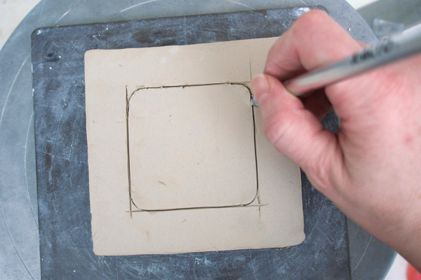 4 Use an X-Acto knife to cut the interior shape of the foot.