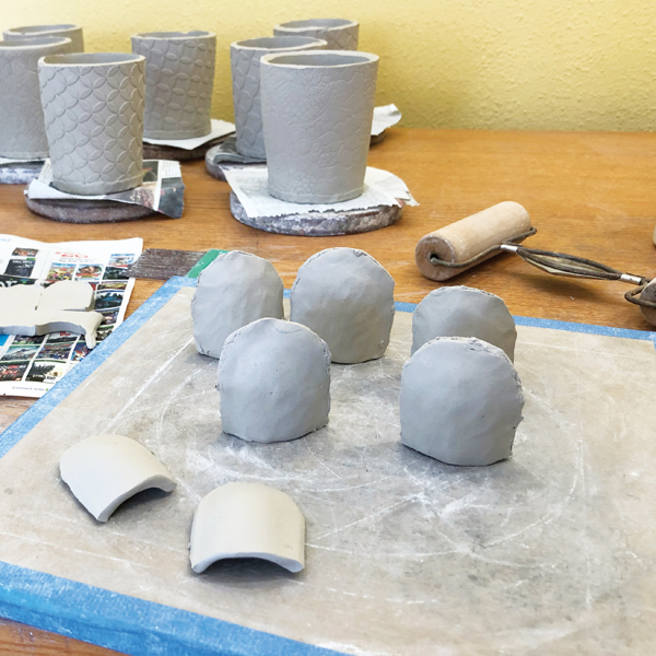 5 Take two of the domes, score the edges, apply slip, then attach them together.