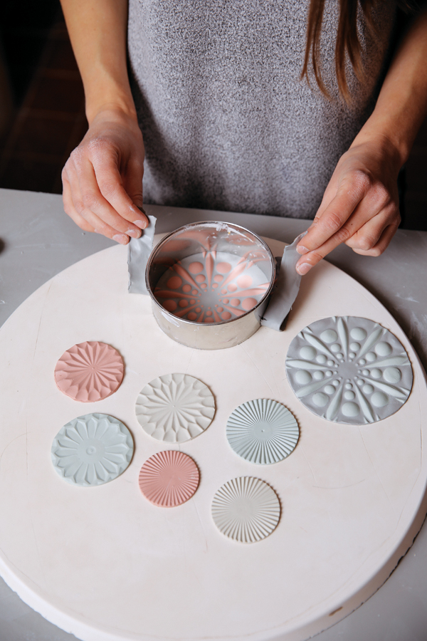 9 Use a cookie cutter to cut the patterned pieces into circles.