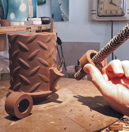 9 Use a tubular rasp to size the inner diameter of handle rings.
