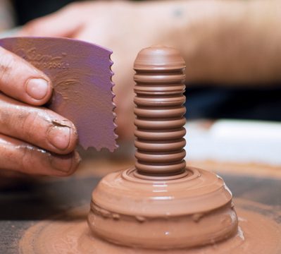 1 Throw, then texture strut-like forms using a serrated rib.