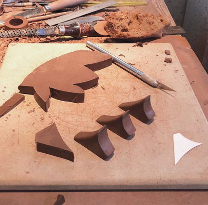 10 Using a template, cut handle brackets from a firm slab.