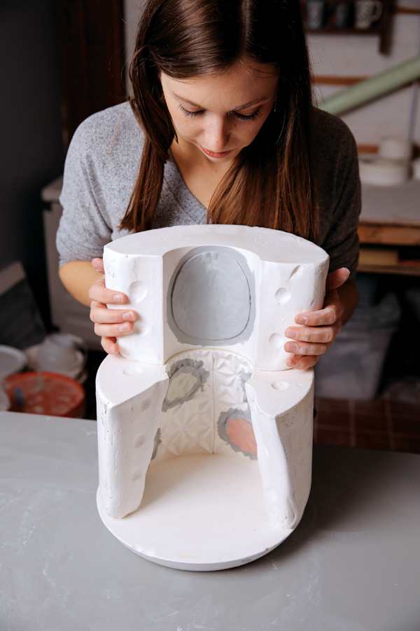 12 Once the patterned pieces are secure, assemble the mold and strap it together.