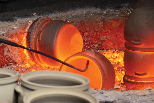6 Radiating glow from pots being immediately transported from the kiln chamber.
