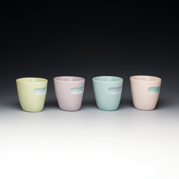  9 Double-walled whiskey sippers, 41/2 in. (11 cm) in height, stained porcelain casting slip, glaze, 2018. 