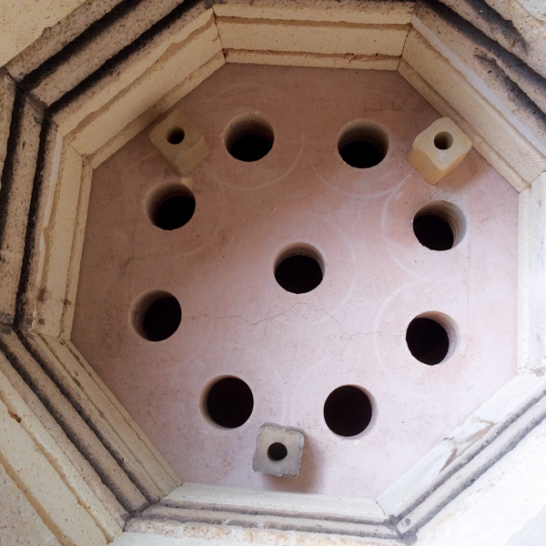 1 The floor of the kiln with the 9 newly drilled holes. 
