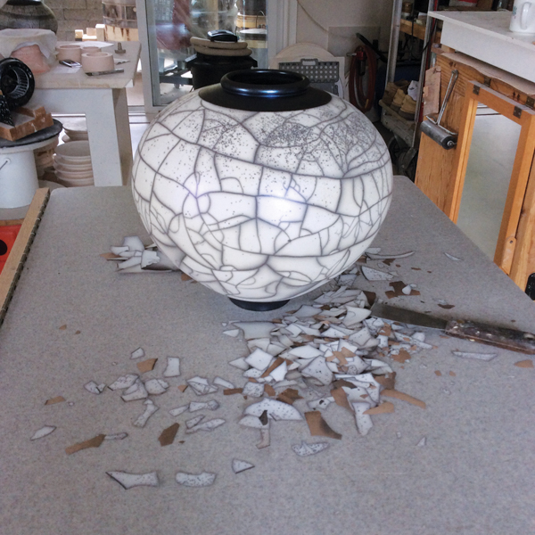 5 Two-step naked raku globe, Sacrificial Slip (recipe: EPK Kaolin—47%, Silica—53%, mix to a specific gravity of 1.15), Sacrificial Glaze (recipe: Ferro Frit 3134—85%, EPK Kaolin—15%, mix to a specific gravity of 1.58). 
