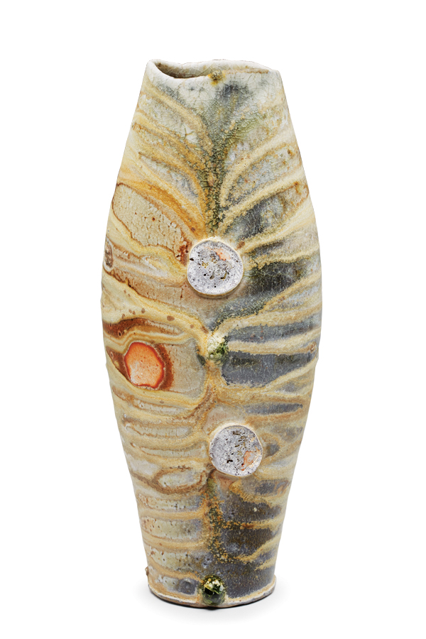 Zac Spates’ side-fired oval vase, fired in a wood kiln and showcases the powerful effects of wood ash and flame on the pots’ surfaces. 