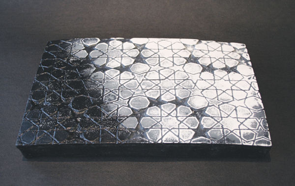 4 Habiba El-Sayed’s Abrasive (part of the Stain series), 11 in. (28 cm) in length, ink-covered bisque, sanded for 30 minutes. 
