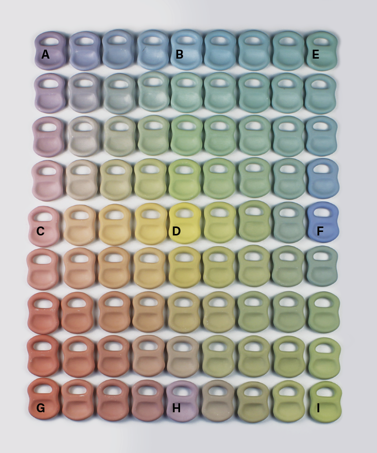 7 Connected quadraxial blend of colored clay test tiles, 36 in. (91 cm) in height, stained porcelain casting slip, 2018.