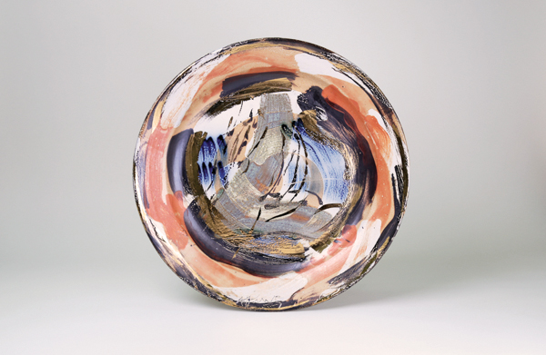 6 Platter, 23 in. (58 cm) in diameter, stoneware, slip decoration, salt fired to cone 12, gold luster. Photo: Nigel Atkins.