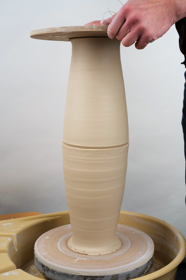 2 Be sure the top of each cylinder is the same diameter. Once joined, cut the bat from the upper cylinder.