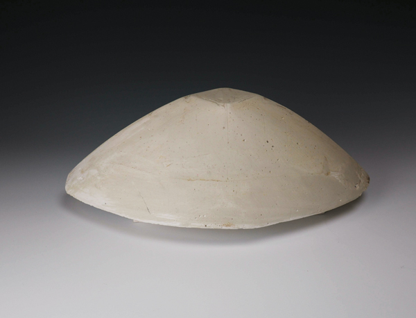5 The plaster conforms to the template, and the resulting hump-mold form represents the negative space inside of the template.