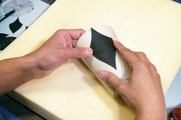 5 Trace the template onto the pot. Line the points up to the middle of the rim and foot.
