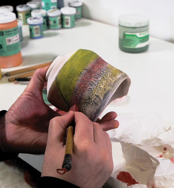  5 Brush rose mauve underglaze across the surface. 