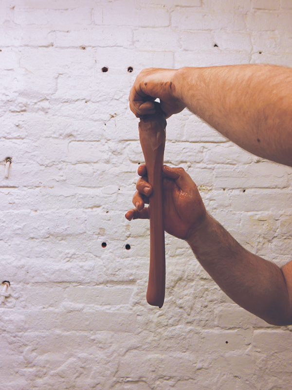 8 Pull a thick handle, then use dry hands to clean excess slip from the surface.