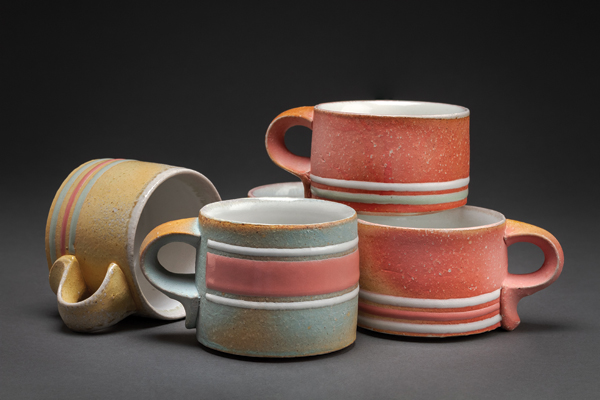2 Mugs, 3½ in. (9 cm) in diameter, porcelain, soda fired to cone 10, 2018. Photo: Robert Batey.