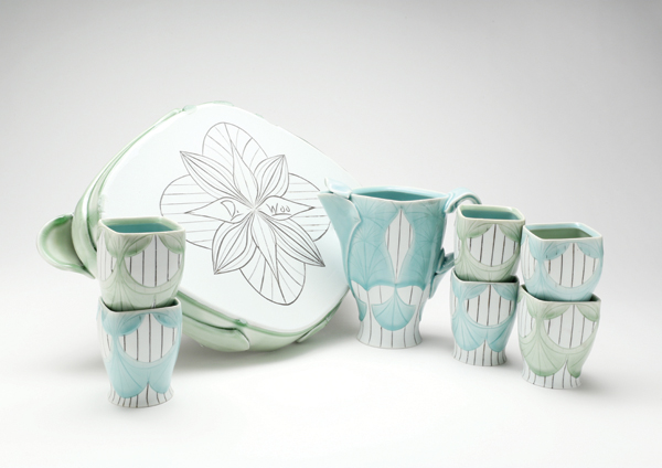 Carved and inlaid pitcher set, wheel-thrown, handbuilt, carved, and inlaid porcelain, glaze, fired to cone 10 in reduction, 2016. Photo: by Amanda Wilkey.