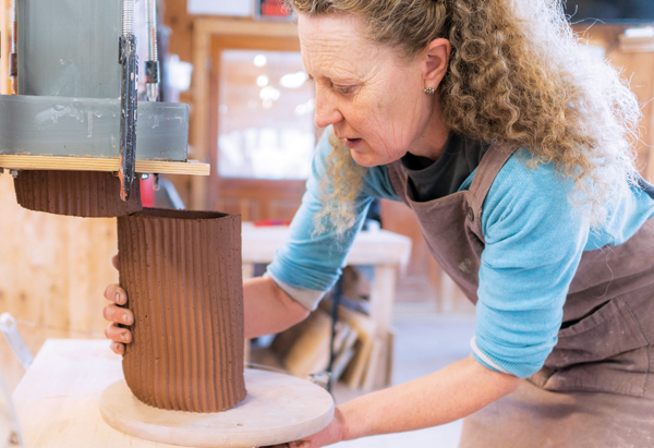 4 Jane Norbury using an extruder at Anderson Ranch Arts Center, 2018. Photo: Levi Basist. 