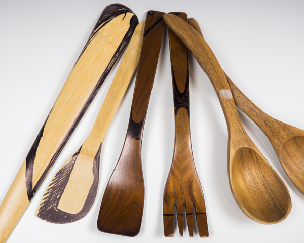 1 Desired shapes of clay tools mapped out on each wooden utensil with a Sharpie marker.