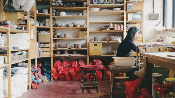 2 Mizuyo Yamashita wheel throwing in her studio. Photo: Nick MacMahon.