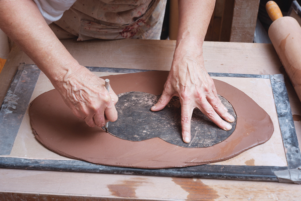1 Attach the tar-paper template of the tray bottom to the slab and cut around it using a sharp X-Acto knife.