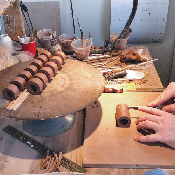 10 Measure and slice rings from a slip-cast (or thrown) cylinder to make handles.