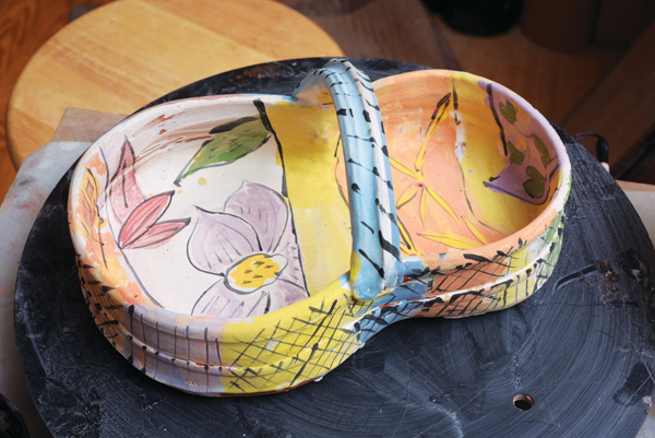 Completed bisqueware, decorated and ready to be glazed.