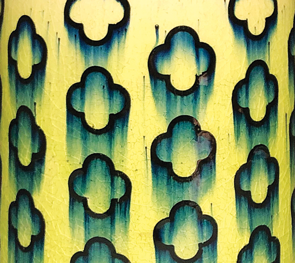 14 During the firing, the flowing glaze drags some of the underglaze in the designs.