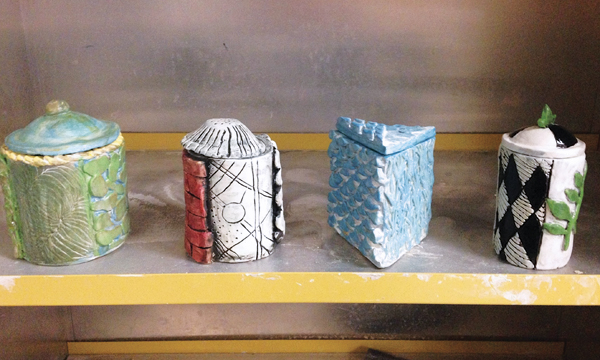2 Finished examples of a lidded box project that encouraged beginning students to consider function and texture while learning to build with slabs. 